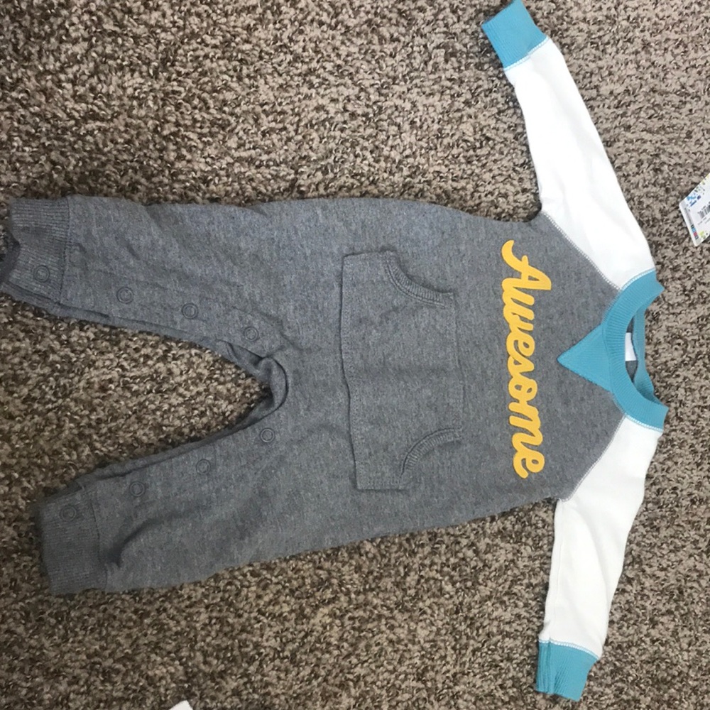 Never been worn or washed Carter’s 3 month romper